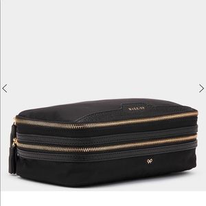 Anya Hindmarch nylon makeup pouch with two sections, zip top and dust bag
